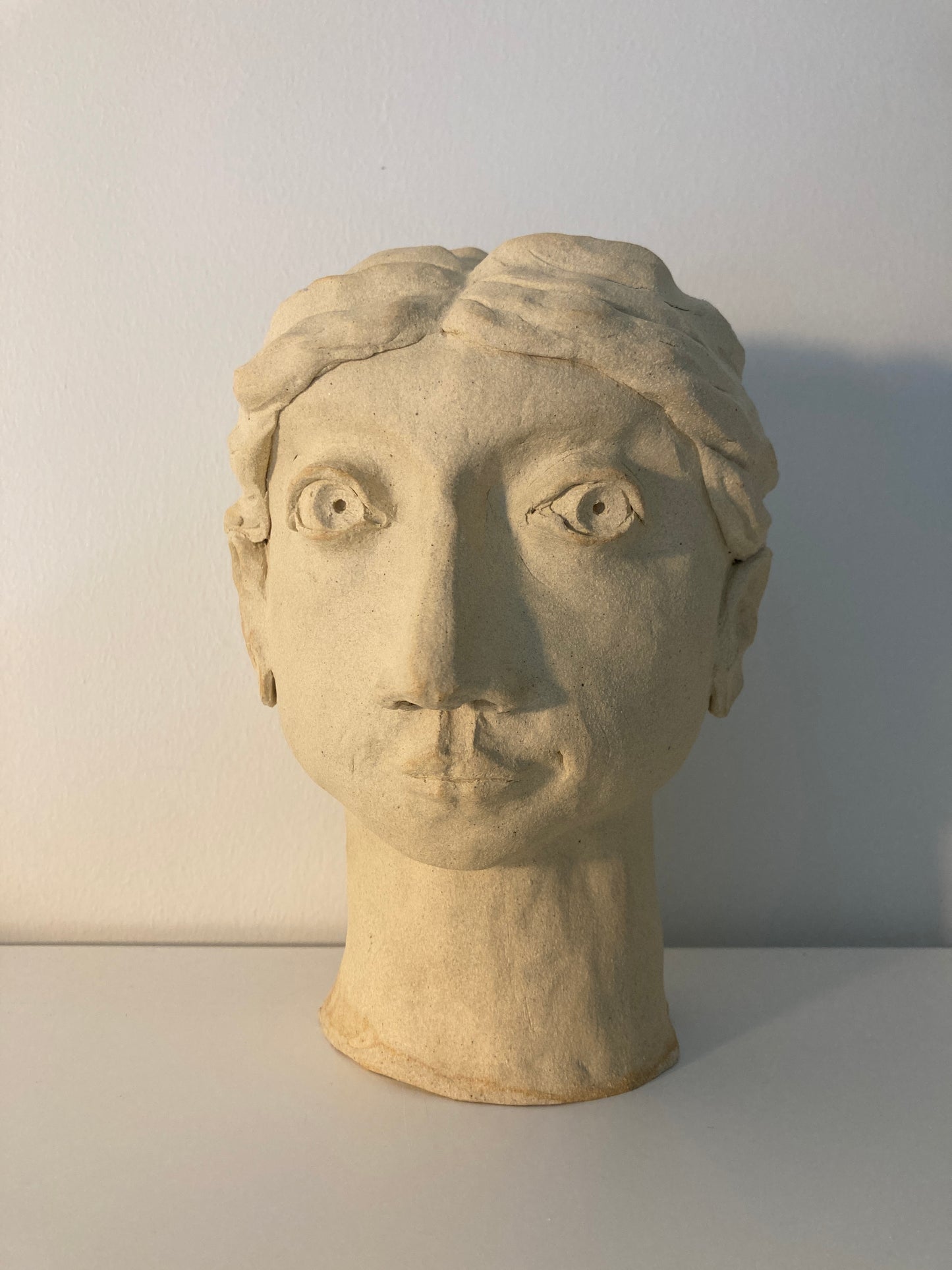 Looking Awry face sculpture