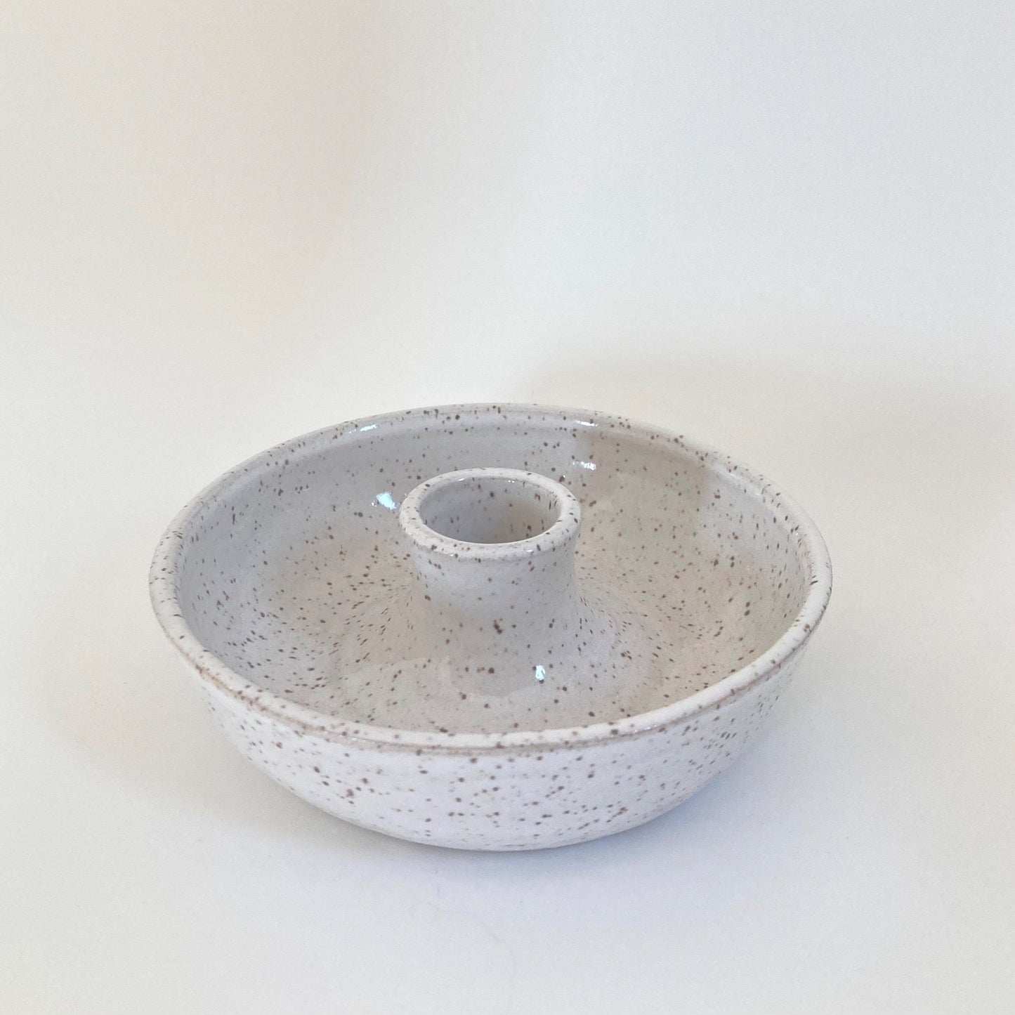 White speckled candleholder