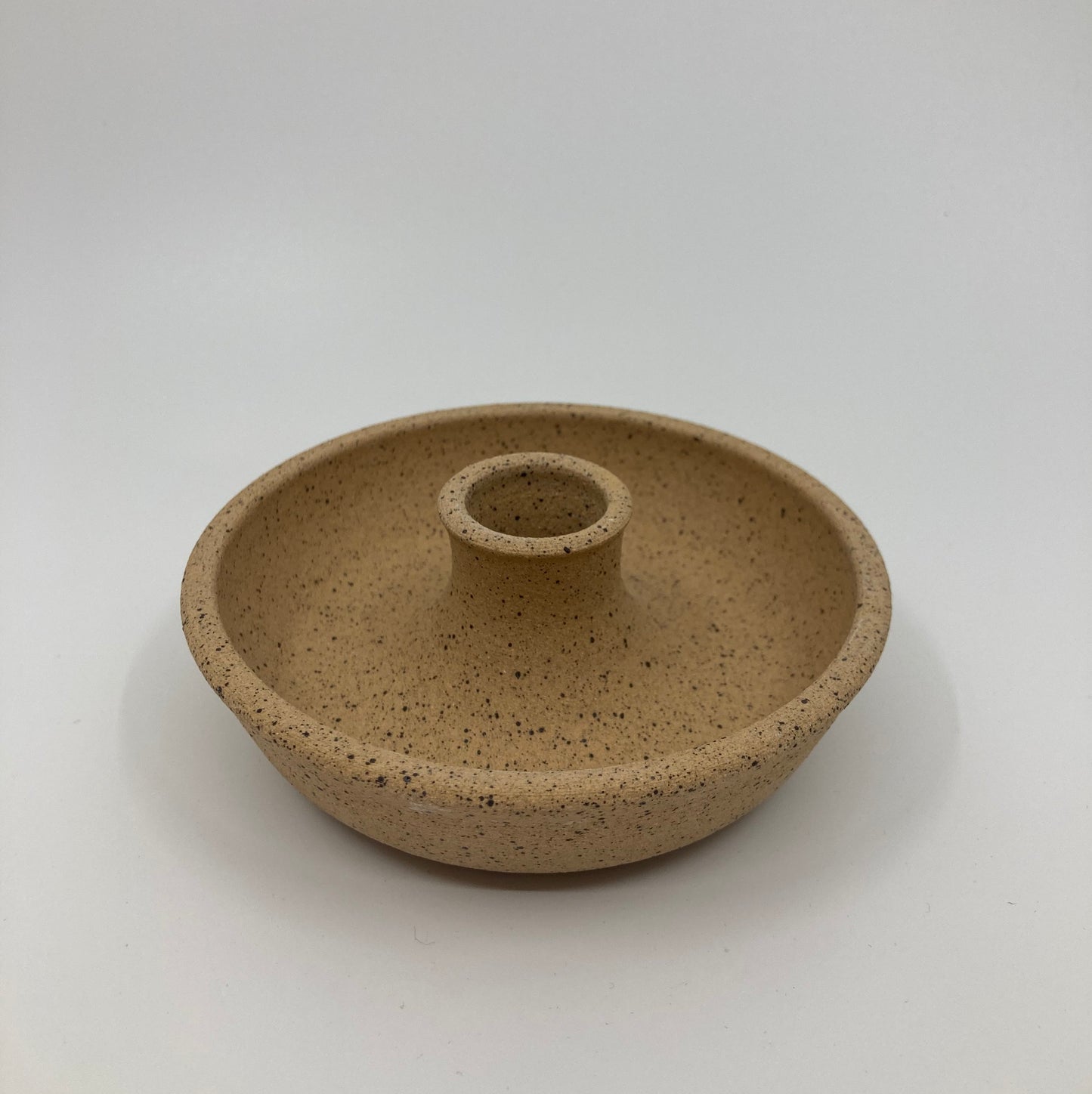 Speckled tan candleholder